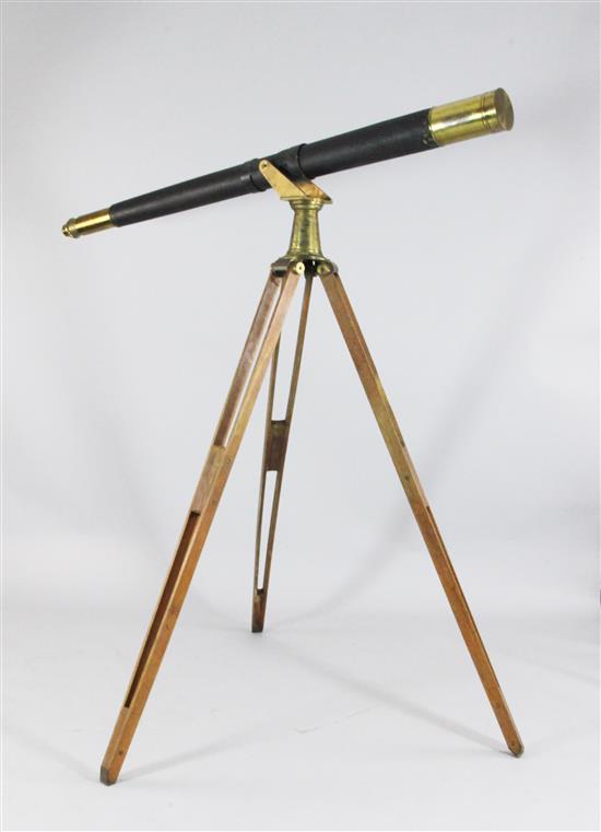A large brass and leather covered telescope by H.Hughes & Son, 5ft 3in.